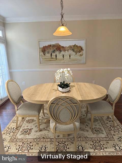 2307 Brooke Grove Rd, Bowie, MD 20721 - dining area featuring wood finished floors and crown molding