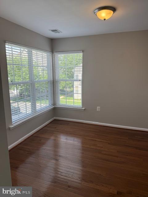 2307 Brooke Grove Rd, Bowie, MD 20721 - unfurnished room with baseboards and wood finished floors