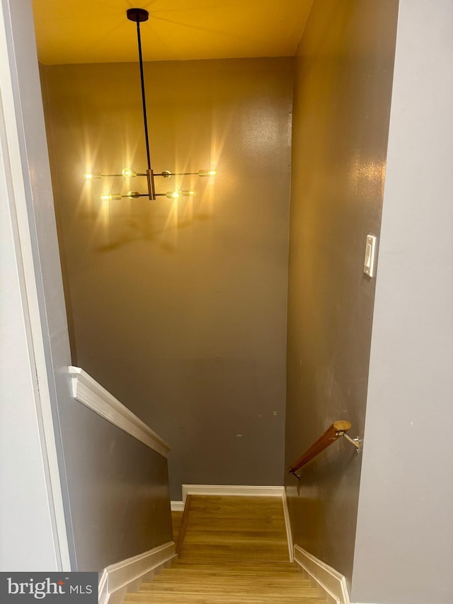 3627 Longridge Ct, Abingdon, MD 21009 - staircase featuring a chandelier, wood finished floors, and baseboards