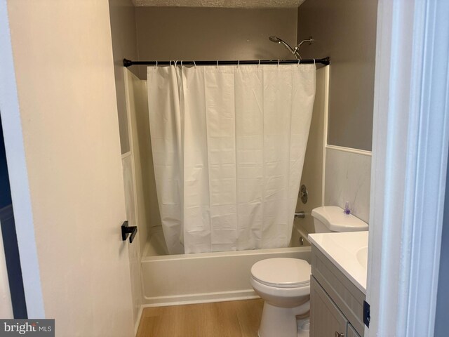 3627 Longridge Ct, Abingdon, MD 21009 - bathroom featuring toilet, shower / bath combination with curtain, wood finished floors, and vanity