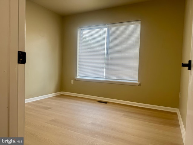 3627 Longridge Ct, Abingdon, MD 21009 - spare room with light wood-style flooring, baseboards, and healthy amount of natural light