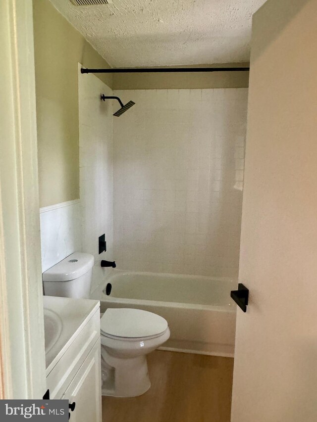 3627 Longridge Ct, Abingdon, MD 21009 - full bathroom featuring toilet, vanity, wood finished floors,  shower combination, and a textured ceiling