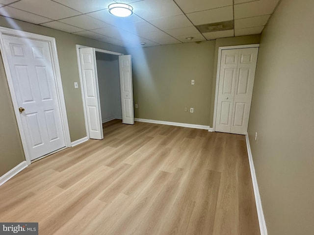 3627 Longridge Ct, Abingdon, MD 21009 - unfurnished bedroom featuring a paneled ceiling, wood finished floors, and baseboards