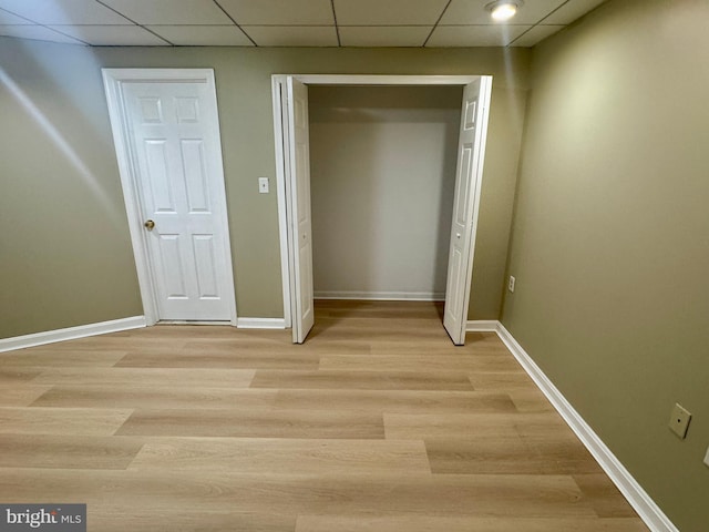 3627 Longridge Ct, Abingdon, MD 21009 - corridor featuring a paneled ceiling, baseboards, and light wood-style flooring