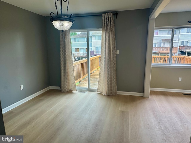 3627 Longridge Ct, Abingdon, MD 21009 - unfurnished dining area with wood finished floors and baseboards