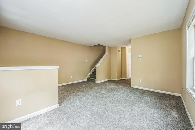 216 Parker Ave, Philadelphia, PA 19128 - unfurnished room with carpet, stairs, and baseboards