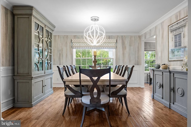 33 Jonquil Dr, Newtown, PA 18940 - dining room featuring a chandelier, ornamental molding, hardwood / wood-style flooring, and a decorative wall