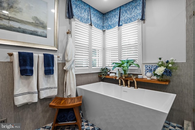 33 Jonquil Dr, Newtown, PA 18940 - bathroom featuring a freestanding bath and wainscoting