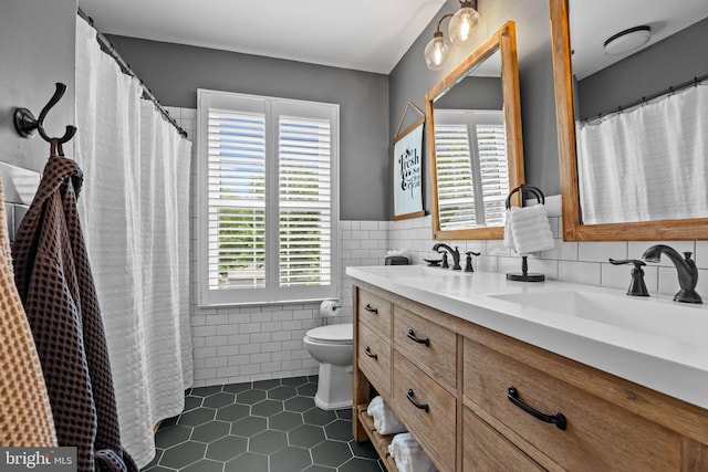 33 Jonquil Dr, Newtown, PA 18940 - full bath featuring tile walls, tile patterned floors, toilet, double vanity, and a shower with shower curtain