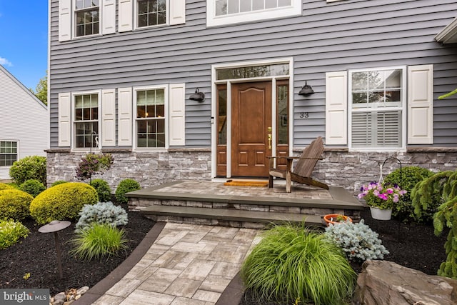33 Jonquil Dr, Newtown, PA 18940 - property entrance featuring stone siding