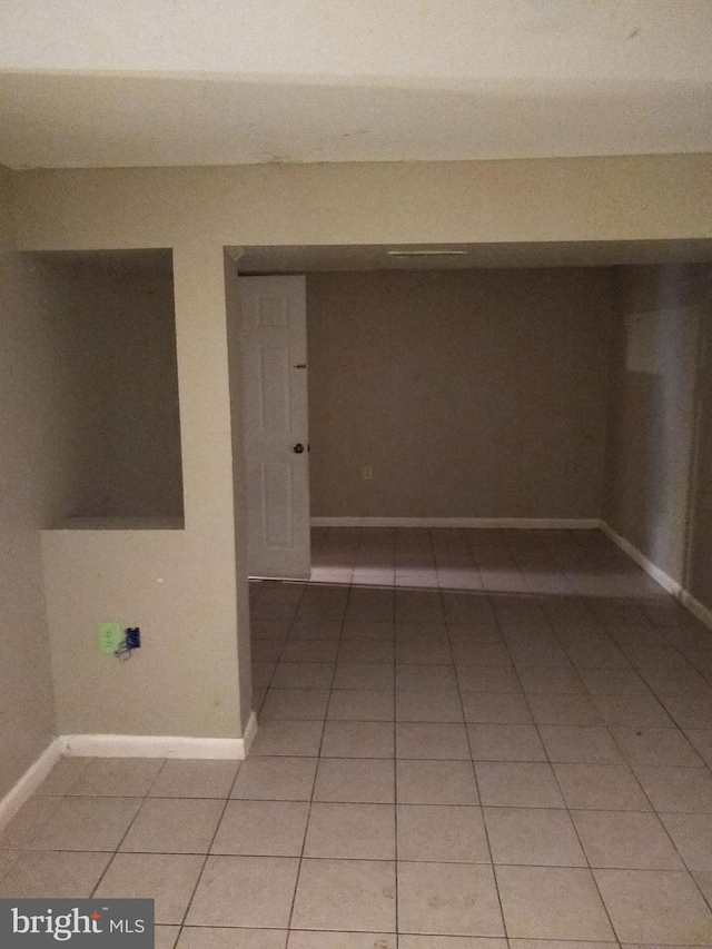 9438 Waterford Dr, Manassas, VA 20110 - unfurnished room with light tile patterned flooring and baseboards