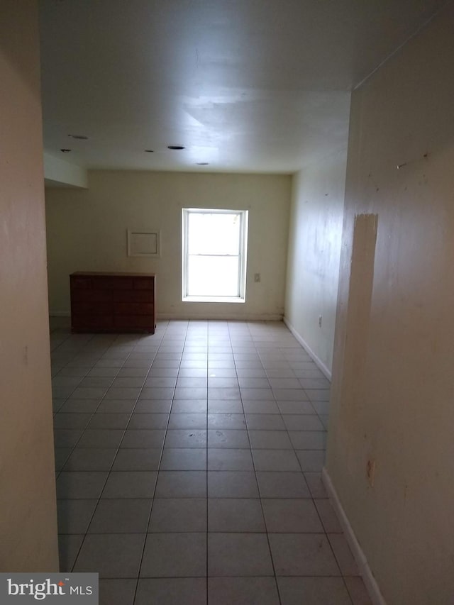 9438 Waterford Dr, Manassas, VA 20110 - spare room with light tile patterned floors and baseboards