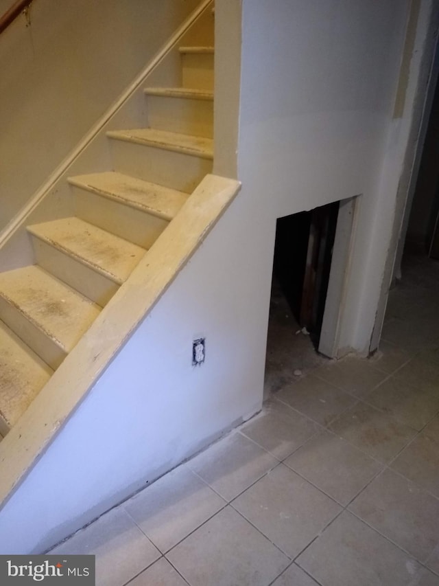 9438 Waterford Dr, Manassas, VA 20110 - staircase featuring tile patterned flooring