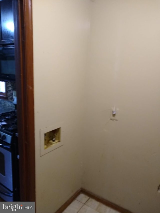 9438 Waterford Dr, Manassas, VA 20110 - laundry room with hookup for a washing machine and baseboards