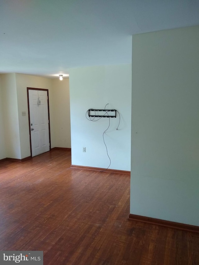 9438 Waterford Dr, Manassas, VA 20110 - unfurnished room featuring wood finished floors and baseboards