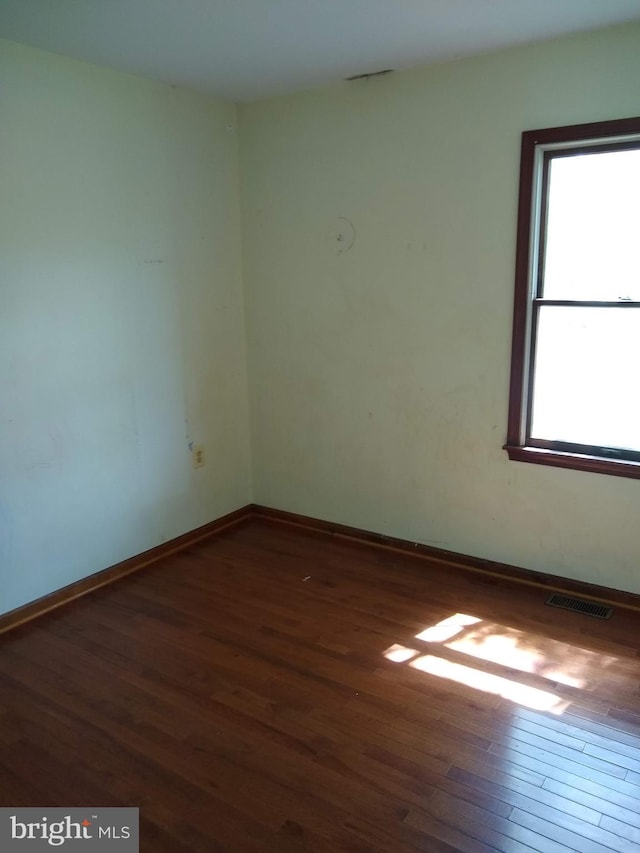 9438 Waterford Dr, Manassas, VA 20110 - unfurnished room with wood-type flooring and baseboards
