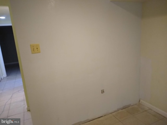 9438 Waterford Dr, Manassas, VA 20110 - spare room with light tile patterned floors and baseboards