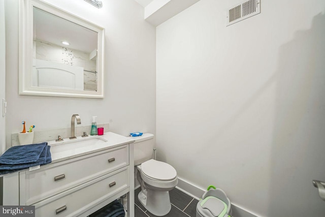 1809 Wilder St, Philadelphia, PA 19146 - bathroom with toilet, vanity, and tile patterned flooring