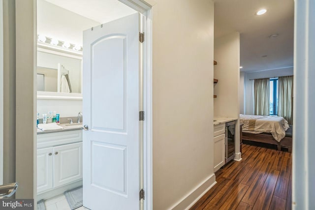 1809 Wilder St, Philadelphia, PA 19146 - hallway featuring a sink, dark wood-style floors, and beverage cooler