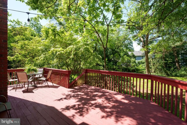 9 Laurel Wood, Lawrenceville, NJ 08648 - wooden deck featuring outdoor dining area