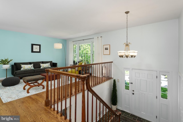 9 Laurel Wood, Lawrenceville, NJ 08648 - foyer featuring a chandelier, wood finished floors, and baseboards