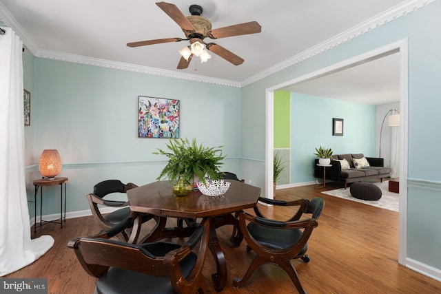 9 Laurel Wood, Lawrenceville, NJ 08648 - dining area featuring wood finished floors, a ceiling fan, crown molding, and baseboards