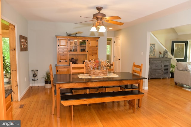 457 Langley Rd, Pittsgrove, NJ 08318 - dining room with ceiling fan, light wood finished floors, and baseboards