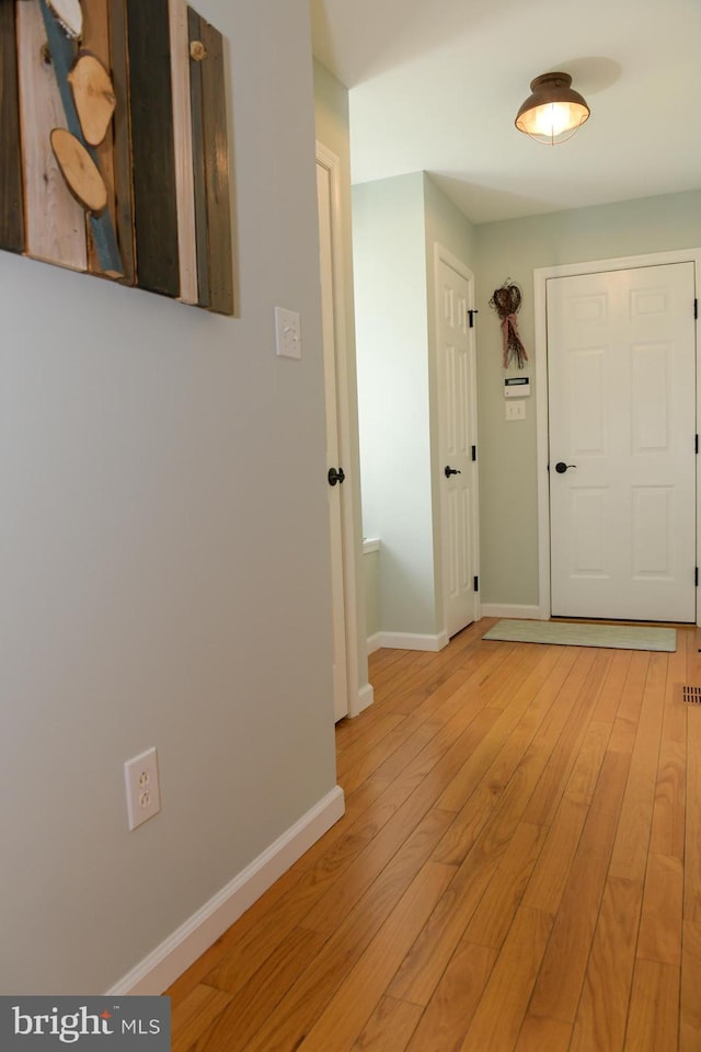 457 Langley Rd, Pittsgrove, NJ 08318 - corridor with light wood finished floors and baseboards