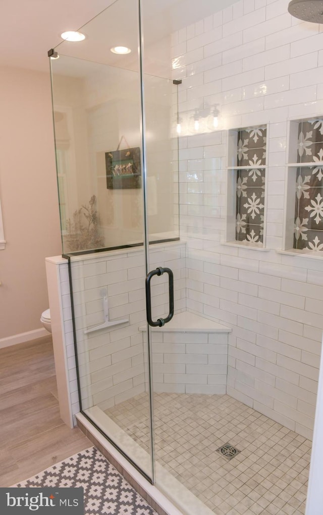 457 Langley Rd, Pittsgrove, NJ 08318 - full bathroom featuring a stall shower, toilet, wood finished floors, baseboards, and recessed lighting