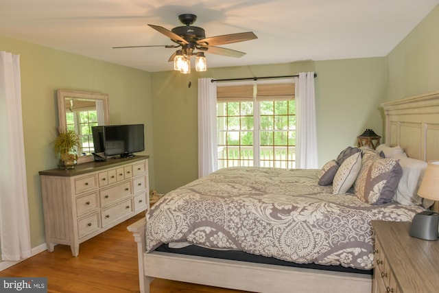 457 Langley Rd, Pittsgrove, NJ 08318 - bedroom with access to outside, light wood finished floors, and a ceiling fan