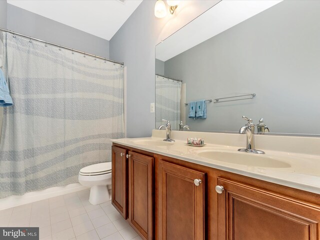 2507 Island Grove Blvd, Frederick, MD 21701 - full bathroom featuring double vanity, toilet, and tile patterned flooring