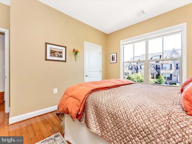 2507 Island Grove Blvd, Frederick, MD 21701 - bedroom featuring light wood-style floors and baseboards