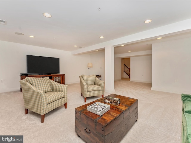 2507 Island Grove Blvd, Frederick, MD 21701 - living room featuring light colored carpet, recessed lighting, stairs, and baseboards