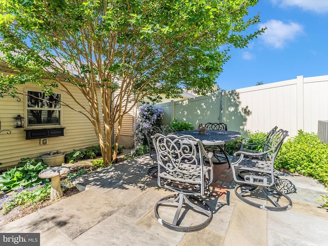 2507 Island Grove Blvd, Frederick, MD 21701 - fenced backyard featuring a patio and outdoor dining area