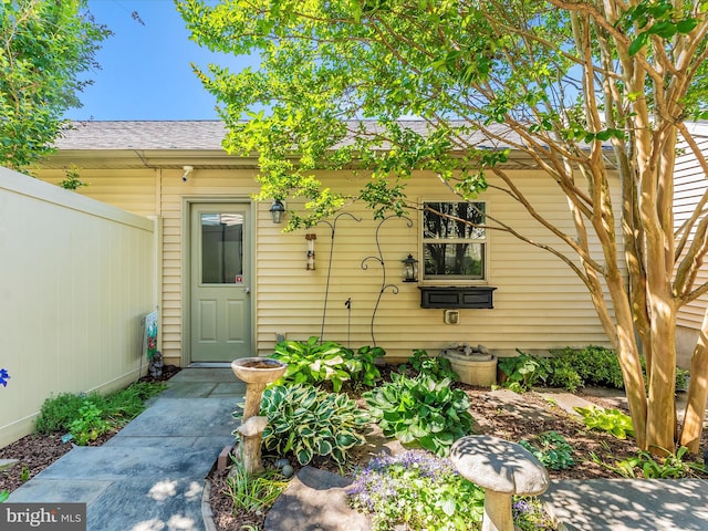 2507 Island Grove Blvd, Frederick, MD 21701 - view of exterior entry featuring a shingled roof