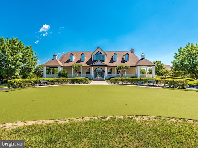 2507 Island Grove Blvd, Frederick, MD 21701 - cape cod-style house with a putting green and a chimney