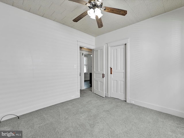 138 W Main St, Schuylkill Haven, PA 17972 - unfurnished bedroom with carpet floors, baseboards, a closet, and ceiling fan