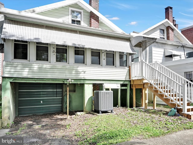 138 W Main St, Schuylkill Haven, PA 17972 - back of property with central air condition unit and a chimney