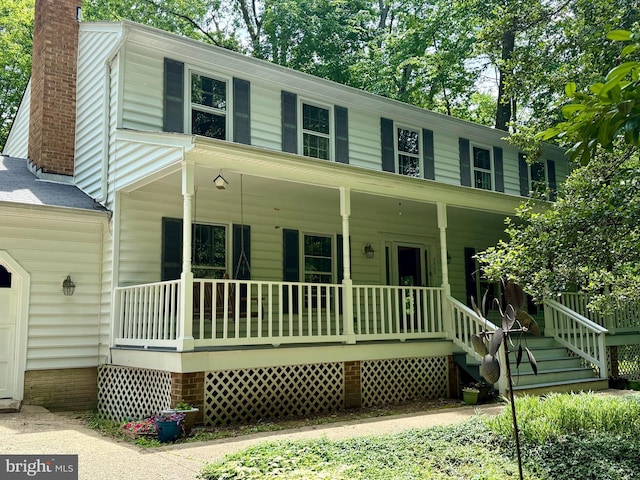 7449 Maple Branch Rd, Clifton, VA 20124 - view of front of house with covered porch and a chimney