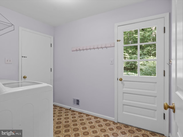 7449 Maple Branch Rd, Clifton, VA 20124 - washroom with washer / clothes dryer, tile patterned floors, and baseboards