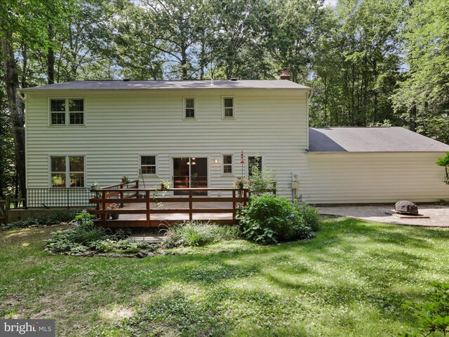 7449 Maple Branch Rd, Clifton, VA 20124 - rear view of property featuring a wooden deck, a yard, and a chimney