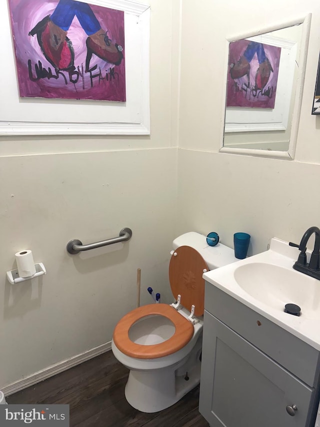 3141 W Norris St, Philadelphia, PA 19121 - bathroom with vanity, toilet, and wood finished floors