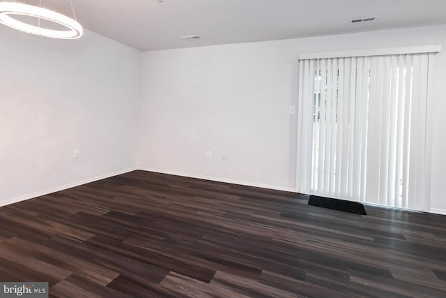 5936 S Hil Mar Cir, District Heights, MD 20747 - spare room with dark wood finished floors and baseboards