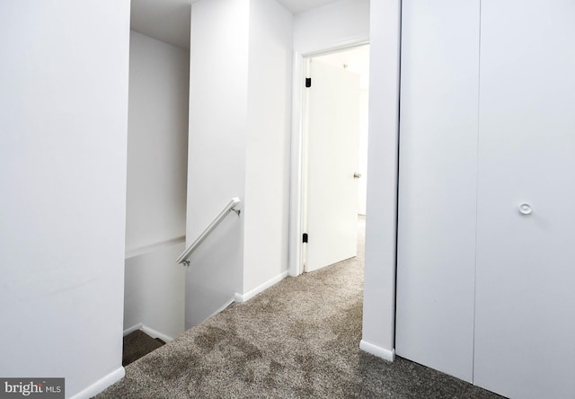 5936 S Hil Mar Cir, District Heights, MD 20747 - hallway featuring an upstairs landing, carpet, and baseboards