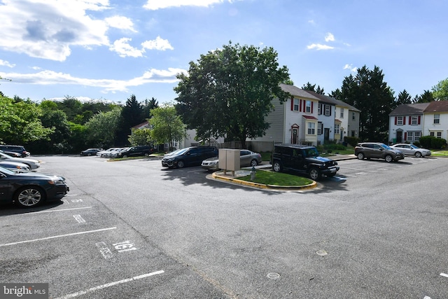 5936 S Hil Mar Cir, District Heights, MD 20747 - uncovered parking lot featuring a residential view