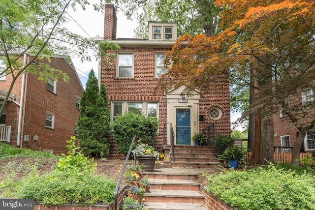 3709 Jocelyn St NW, Washington, DC 20015 - view of front of property featuring brick siding and a chimney