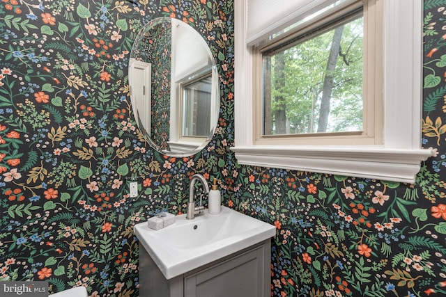 3709 Jocelyn St NW, Washington, DC 20015 - bathroom featuring wallpapered walls and vanity