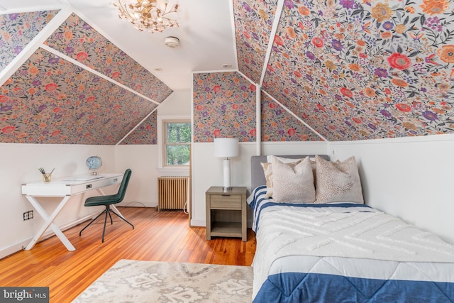 3709 Jocelyn St NW, Washington, DC 20015 - bedroom featuring radiator heating unit, wood finished floors, and vaulted ceiling