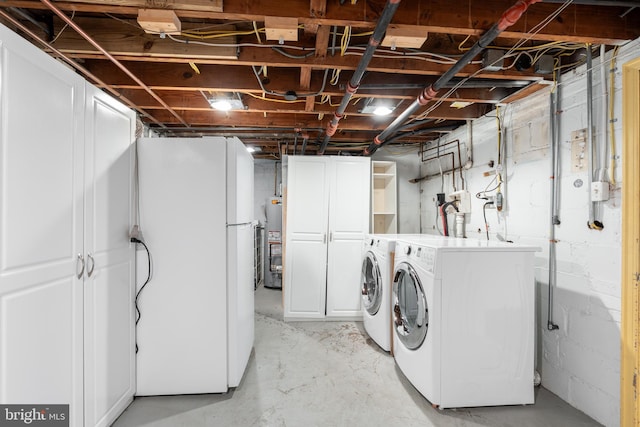 3709 Jocelyn St NW, Washington, DC 20015 - laundry area with water heater, cabinet space, and washing machine and clothes dryer