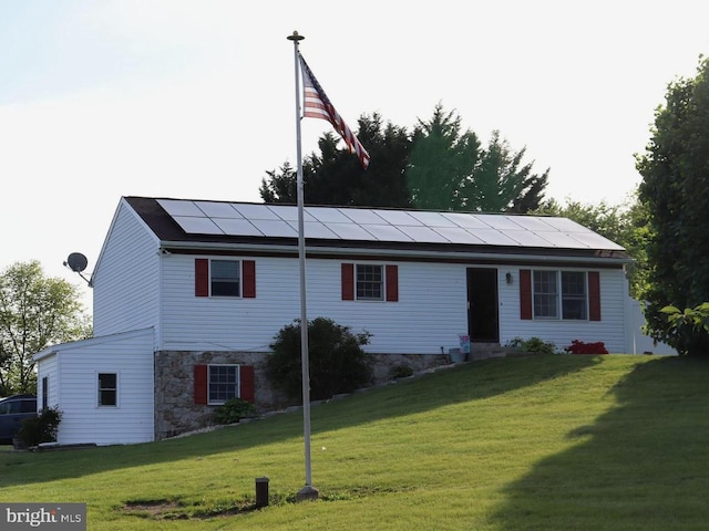 1300 River Rd, Holtwood, PA 17532 - ranch-style home featuring solar panels, a front yard, and stone siding